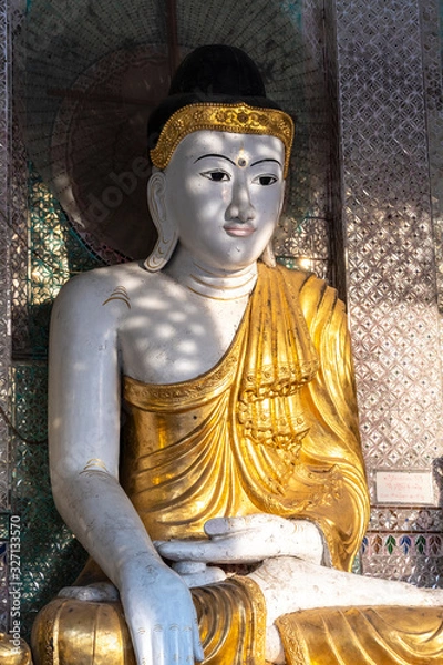 Obraz Ornate seated Buddha statue at Shwedagon Paya