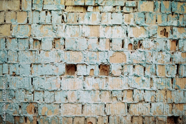 Fototapeta Blue bricks falling apart