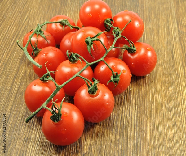Obraz Beautiful tomatoes on a white background