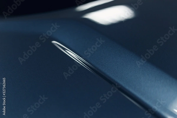 Fototapeta The car's paintwork. Abstract background in classic blue. Trend color. Close up. The texture of the paint