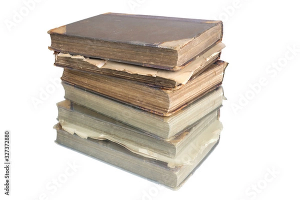 Fototapeta Stack of old vintage books reflecting on a white surface