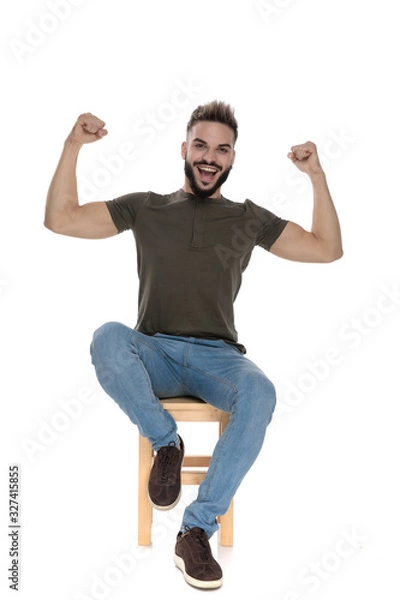 Fototapeta Happy casual man flexing and laughing