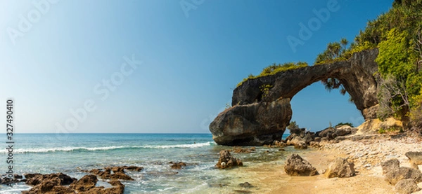 Fototapeta Panorama of the natural coral bridge on Lakshmanpur beach no 2 on Neil Island in Andaman and Nicobar Islands, India during high tide without people. 