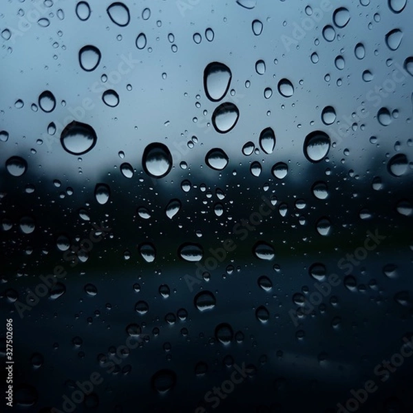 Obraz Raindrops on a window moody dark scene