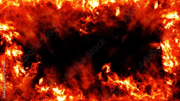 Fototapeta Fire burn on black background with copy space. A fiery frame surrounding the screen on black isolated background