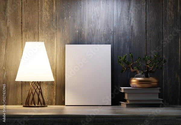 Obraz Book template on the shelf in the night interior. Illumination from the desk lamp. Bonsai tree on a stack of books. Wooden background. 3D rendering.