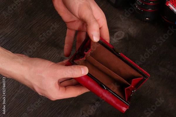 Fototapeta empty wallet in hands