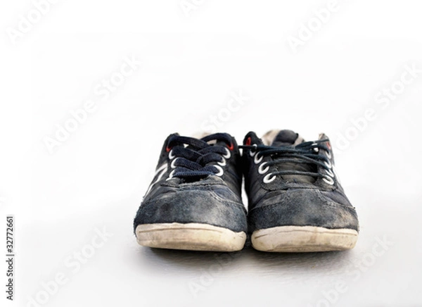 Fototapeta Blue sneakers isolated on white
