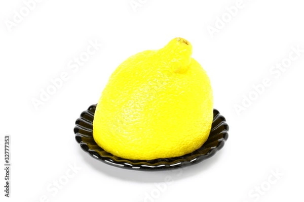 Obraz Lemon on black plate