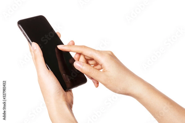 Fototapeta Woman hand hold a smartphone, empty screen side isolated on white.