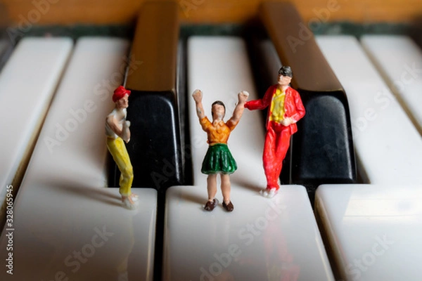 Obraz Miniature People having a party on a piano