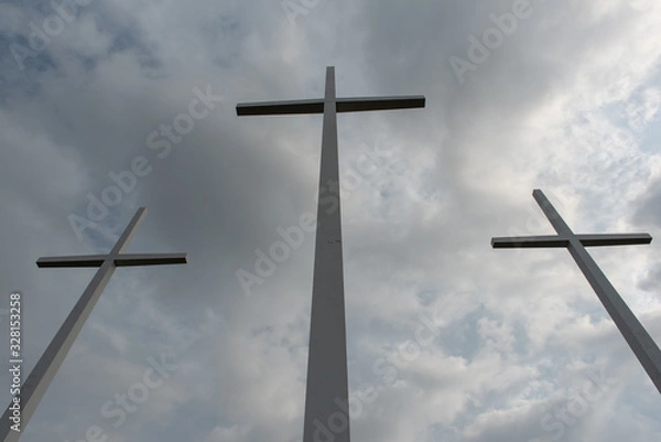 Obraz Three crosses with dark sky