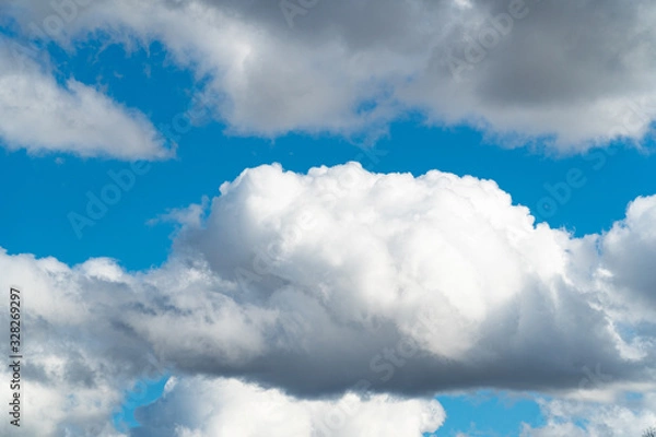 Obraz Blue sky with fluffy clouds