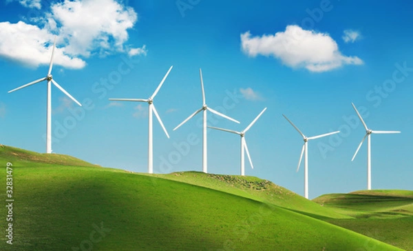 Fototapeta Wind turbines on green hills