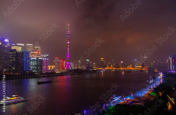 Fototapeta Large famous Shanghai tower reflected in Huangpu 