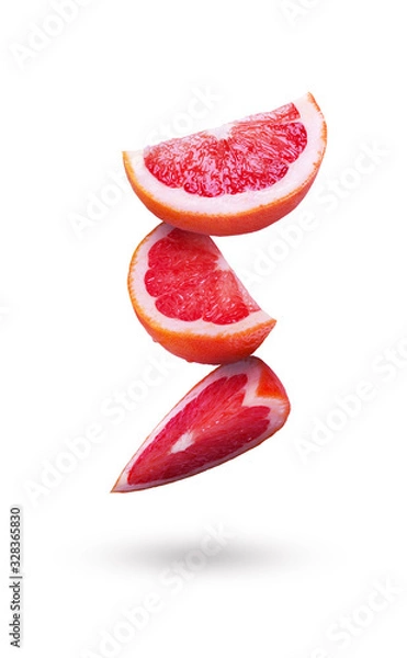 Obraz Grapefruit. Grapefruit slices on a white background.