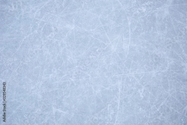 Fototapeta texture of ice skates traces on the blue ice