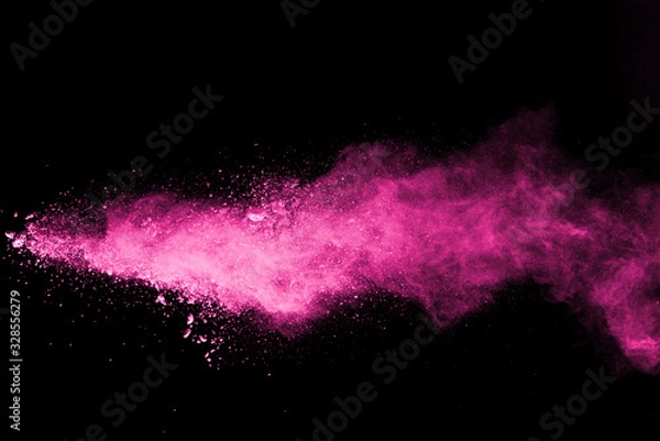 Obraz Pink powder explosion on black background. Colored cloud. Colorful dust explode. Paint Holi.