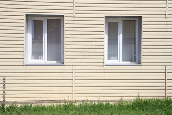 Obraz Стена дома, обшитая виниловым сайдингом