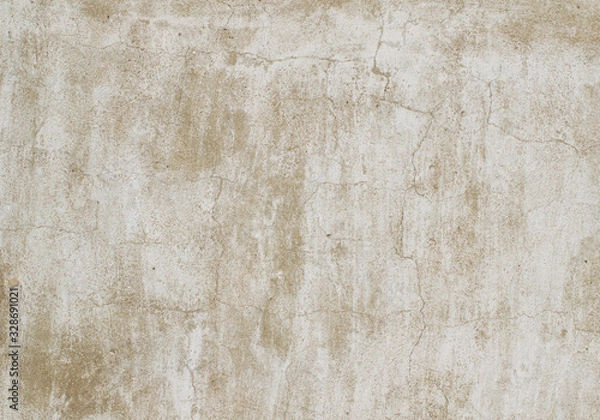 Fototapeta Aged plaster with cracks. Weathered white, old whitewash, visible particles of brown sand. A high resolution. Quality background.