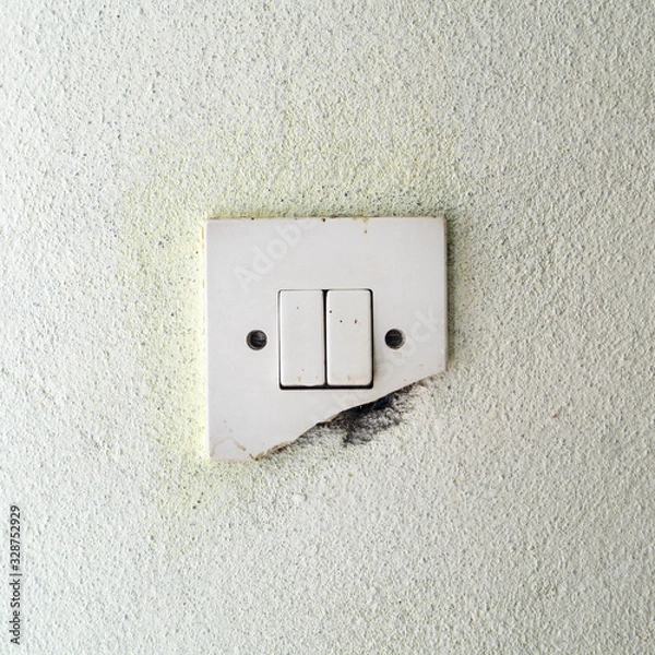 Obraz Old damage light switch on white wall