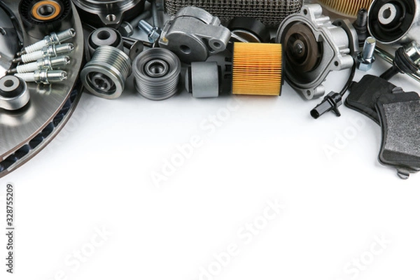Fototapeta new car parts on white background with copy space view from above