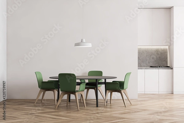 Obraz White kitchen with dining table and green chairs