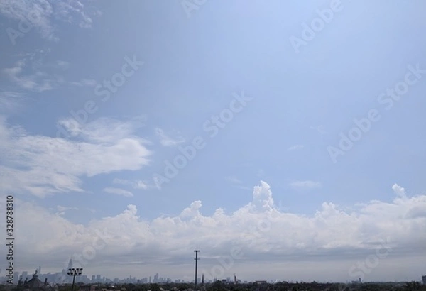 Fototapeta Clouds and Skyline