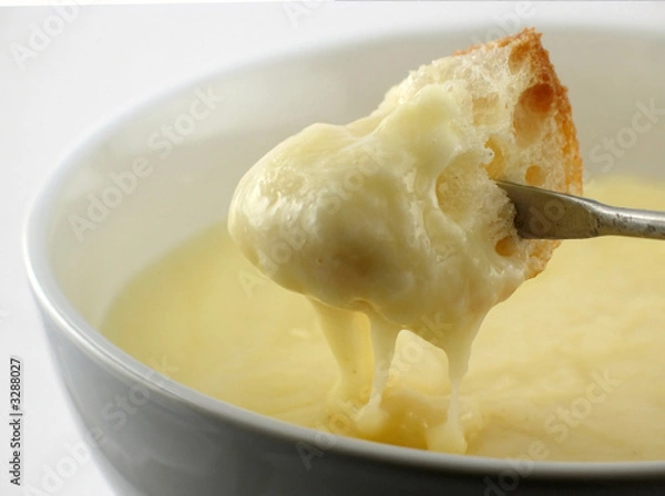 Obraz cheese fondue half dipped