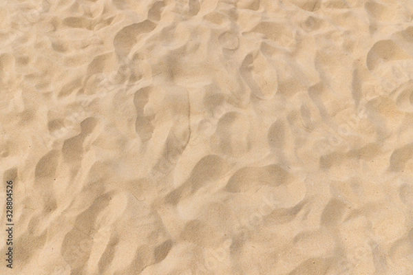 Fototapeta Close up of beautiful sand texture on the beach in summer time as background