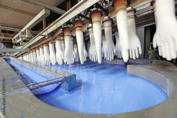 Fototapeta View of nitrile butadiene gloves on conveyor belt in factory