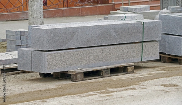 Obraz Tile blocks on pallets lie next to each other