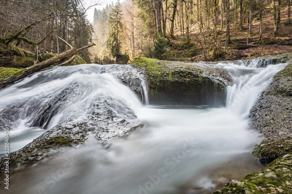 Fototapeta A big waterfall in the forest