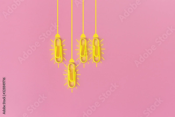 Fototapeta Great ideas concept with paperclip,thinking,creativity,light bulb on blue background,new ideas concept.