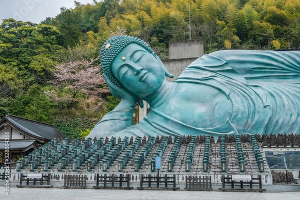 Fototapeta Reclining Buddha bronze statue