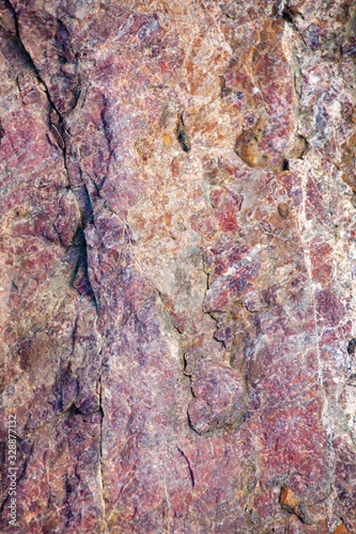 Obraz Orange red purple texture of large stone suitable as background