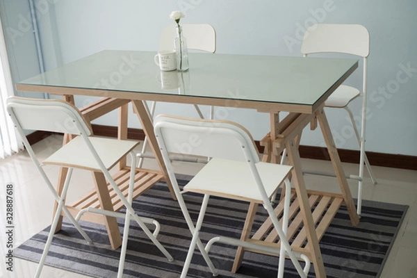 Fototapeta tables and chairs in cafe