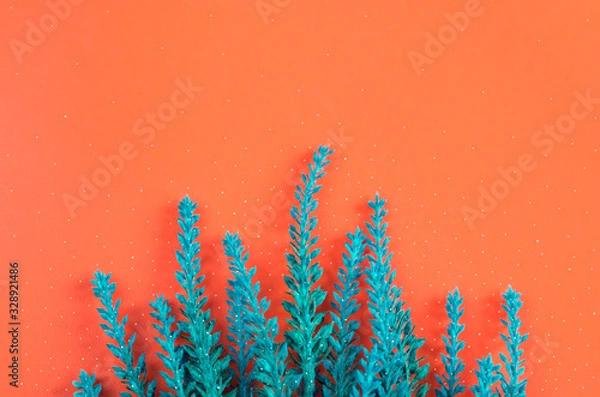 Fototapeta A bunch of lavender on orange background top view. Horizontal spring greeting card with copy space