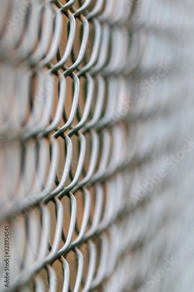 Obraz Close up of a green cyclone fence
