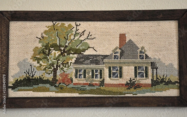 Obraz Cross stitched old house in frame