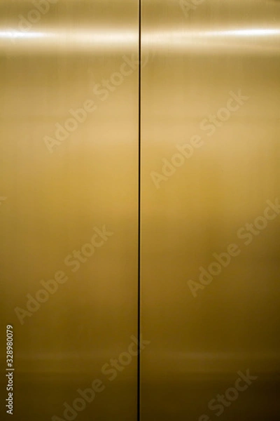 Obraz gold metal elevator door