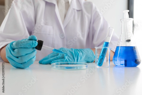 Fototapeta Medical scientists have experimented with liquid chemicals in vitro to analyze viral data in chemical laboratories. Scientific research concepts