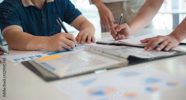 Fototapeta Teamwork concepts, analysis, consultation, exchange of ideas and work plans.