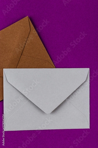 Obraz Colorful envelopes on a purple background.