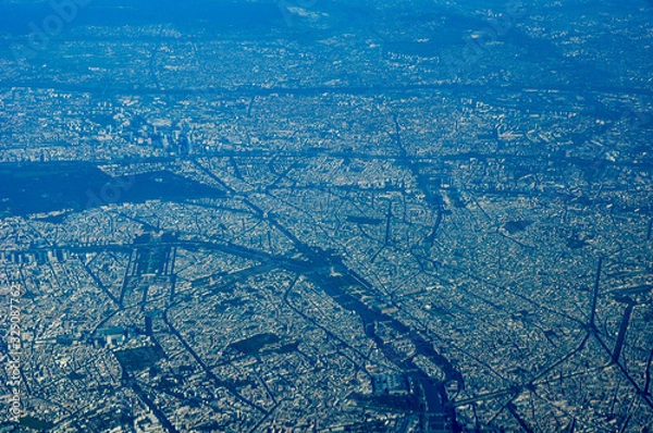 Obraz Aerial shot of the city of Paris up high from a plane with main landmarks visible like the Eiffel Tower or Arc de Triomphe