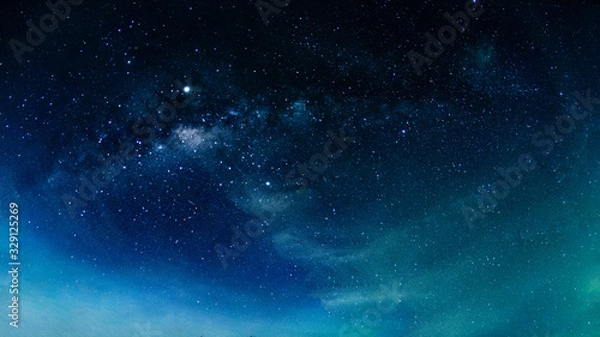 Fototapeta Milky way galaxy with stars and space in the universe background at thailand