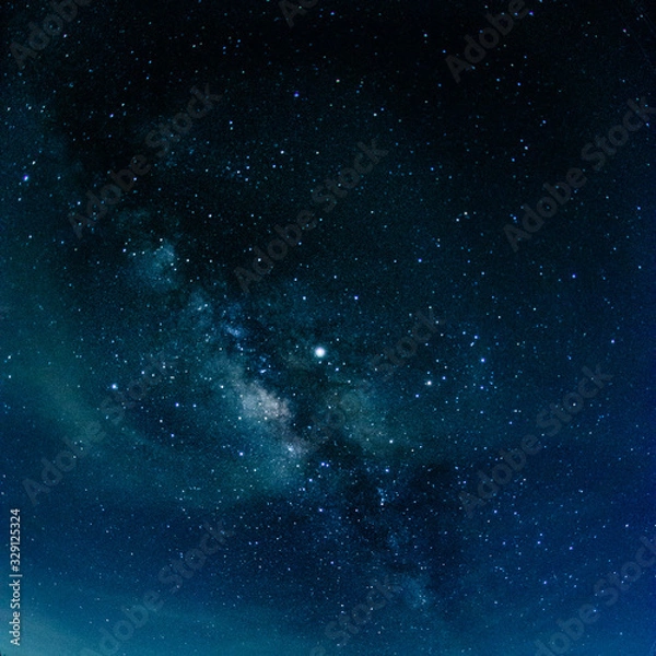 Fototapeta Milky way galaxy with stars and space in the universe background at thailand