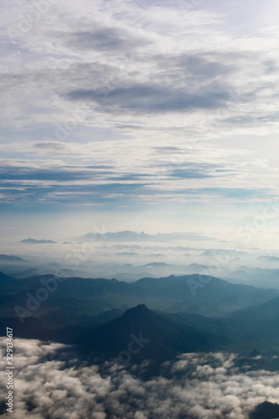 Fototapeta clouds over the mountains