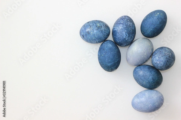 Obraz easter eggs classic blue color on a white background, top wiew