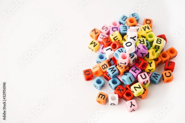 Fototapeta Small coloring alphabet cubes on the white background